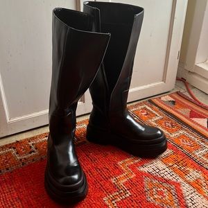 Platform boots. Water waders.